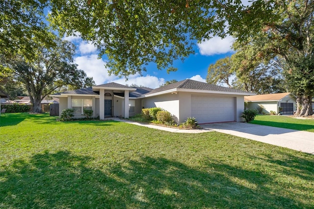 view of front of home featuring a garage and a front lawn