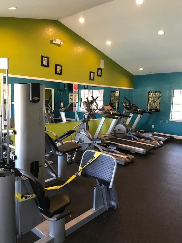 workout area with vaulted ceiling