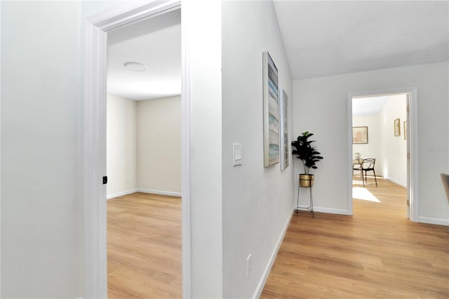 hallway featuring light hardwood / wood-style floors