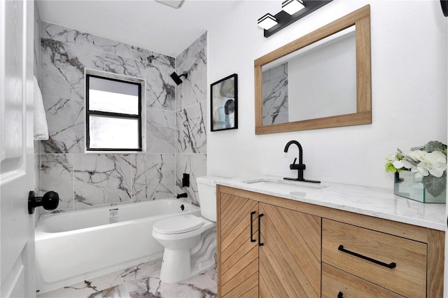 full bathroom with tiled shower / bath, vanity, and toilet