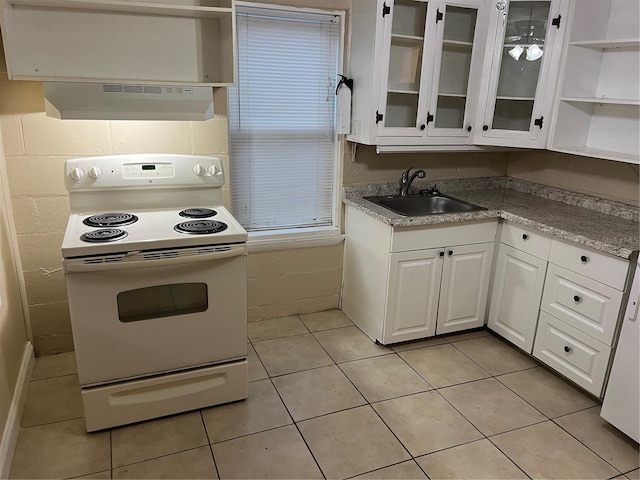 kitchen featuring ventilation hood, sink, light tile patterned floors, white electric range, and white cabinetry