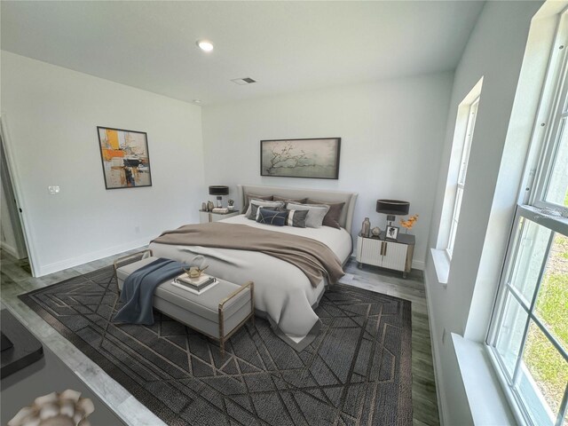 bedroom featuring wood-type flooring