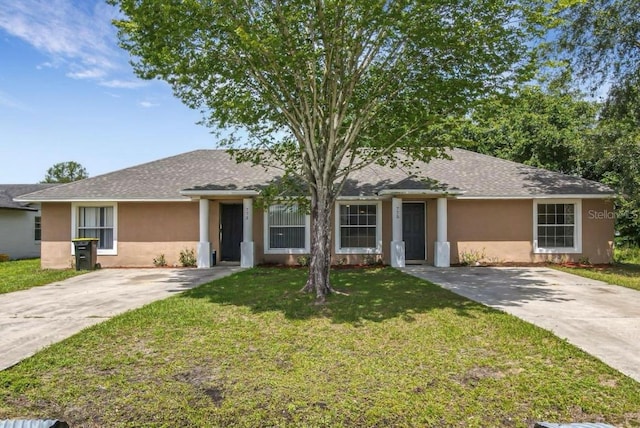 ranch-style house featuring a front yard