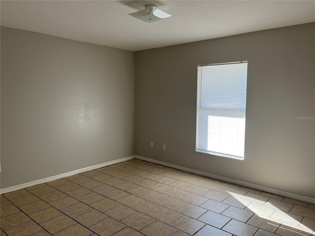 view of tiled empty room