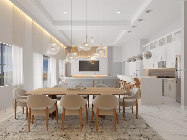 dining room with a tray ceiling