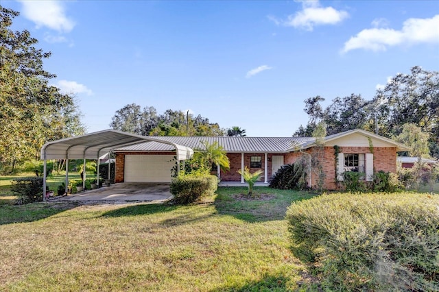 ranch-style house with a carport, a garage, and a front lawn