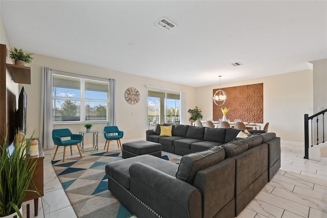 living room with a chandelier