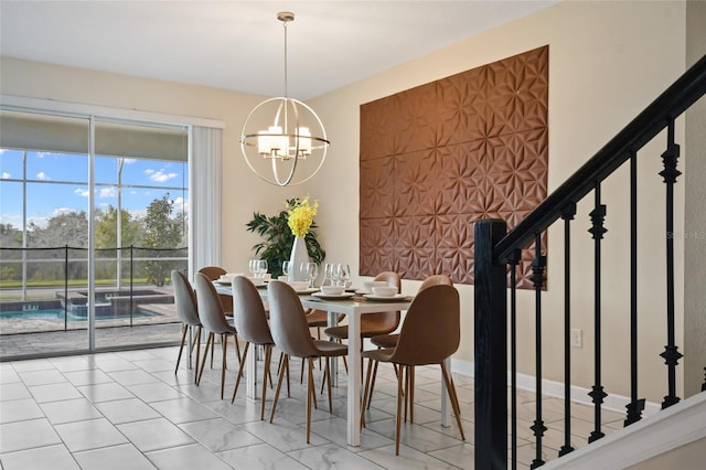 dining space with a notable chandelier