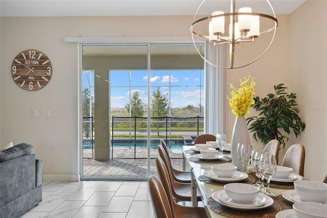 dining room featuring an inviting chandelier