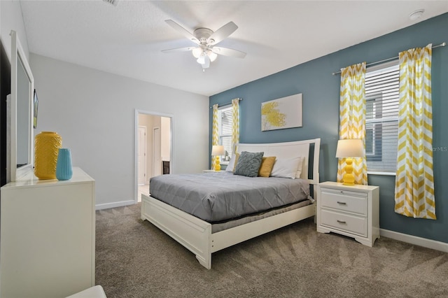 bedroom with dark carpet and ceiling fan