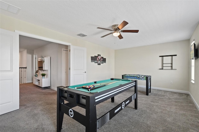 game room featuring ceiling fan, carpet floors, a textured ceiling, and pool table