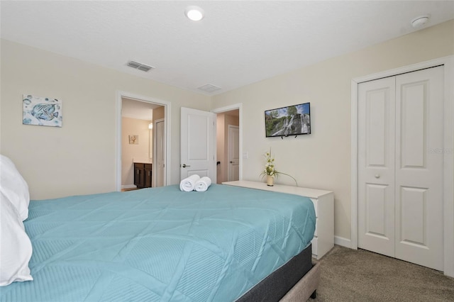 carpeted bedroom featuring a closet