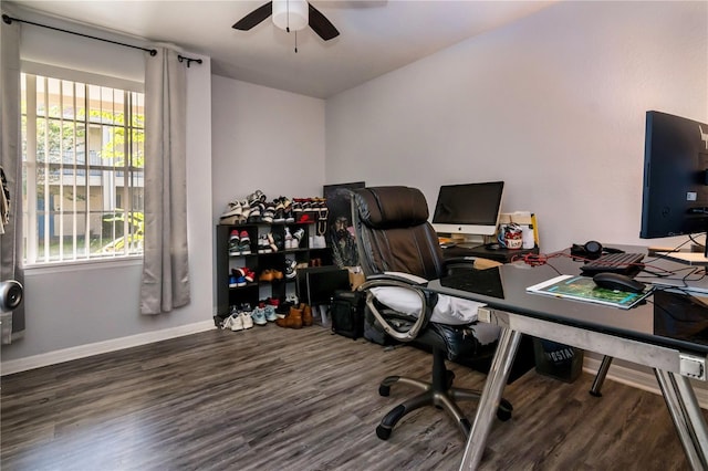 home office featuring a wealth of natural light, dark wood-type flooring, and ceiling fan