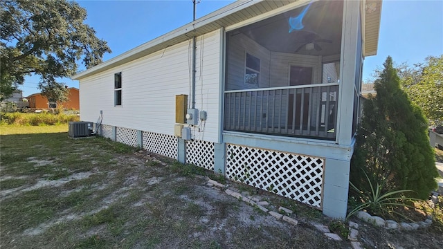 view of home's exterior with central AC