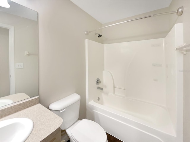 full bathroom featuring vanity, bathing tub / shower combination, and toilet