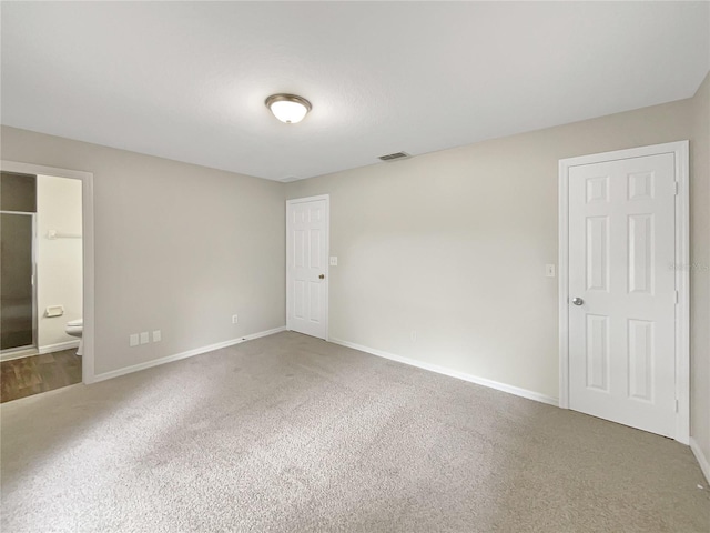 spare room with carpet flooring