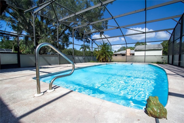 view of pool featuring a lanai and a patio area