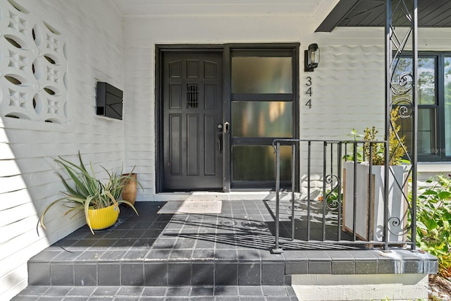 entrance to property with covered porch