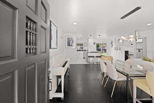 dining room with dark wood-type flooring