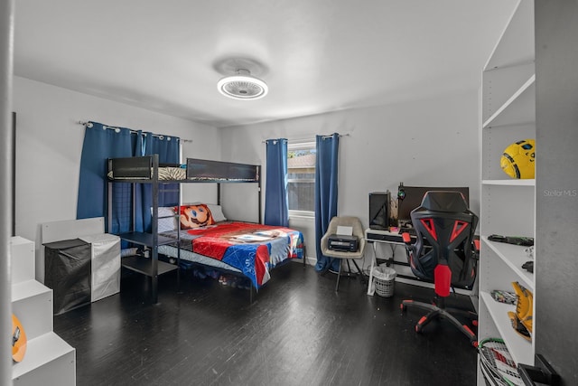 bedroom featuring wood-type flooring