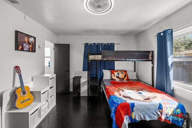 bedroom featuring dark wood-type flooring