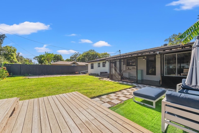 view of yard with a wooden deck