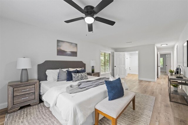 5016 Dorman Rd, Lakeland, FL 33813 - bedroom featuring light wood-style flooring and a ceiling fan