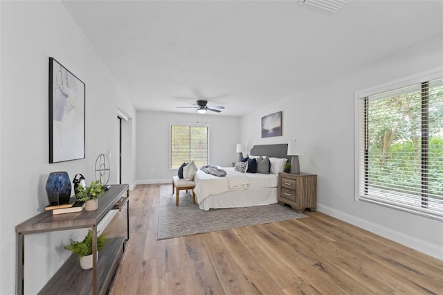 5016 Dorman Rd, Lakeland, FL 33813 - bedroom with light wood-type flooring and a ceiling fan