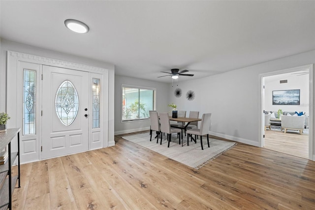 foyer entrance featuring ceiling fan and light hardwood / wood-style floors