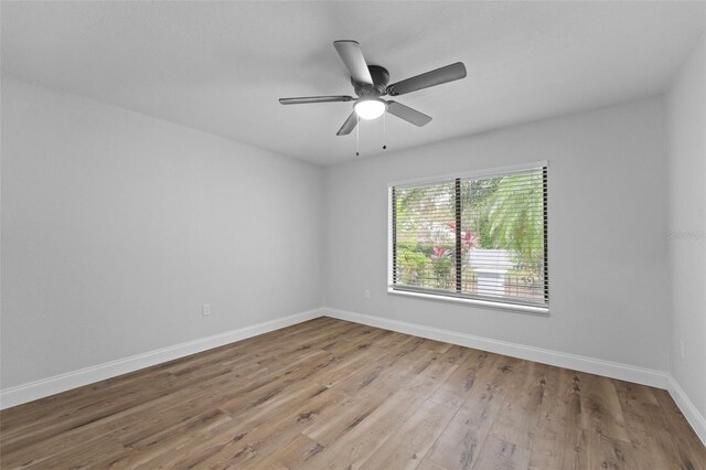 5016 Dorman Rd, Lakeland, FL 33813 - spare room with wood finished floors and a ceiling fan