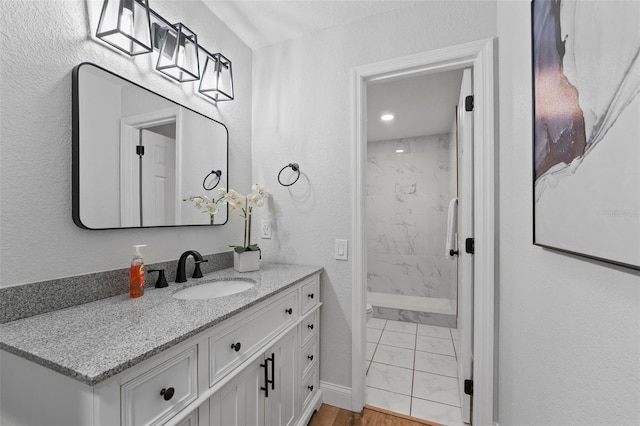 5016 Dorman Rd, Lakeland, FL 33813 - bathroom featuring a marble finish shower and vanity