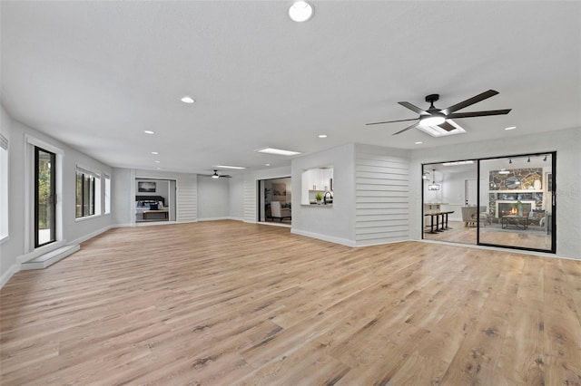 5016 Dorman Rd, Lakeland, FL 33813 - unfurnished living room with ceiling fan, recessed lighting, and light wood finished floors
