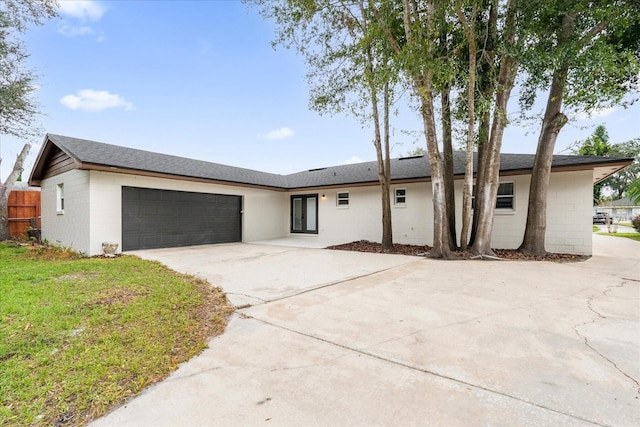 ranch-style home with a garage