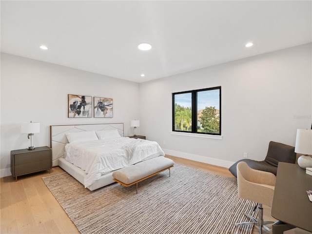 bedroom with wood-type flooring