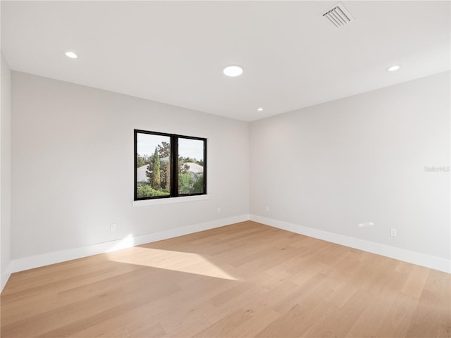 empty room with light wood-type flooring