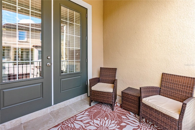 entrance to property featuring french doors