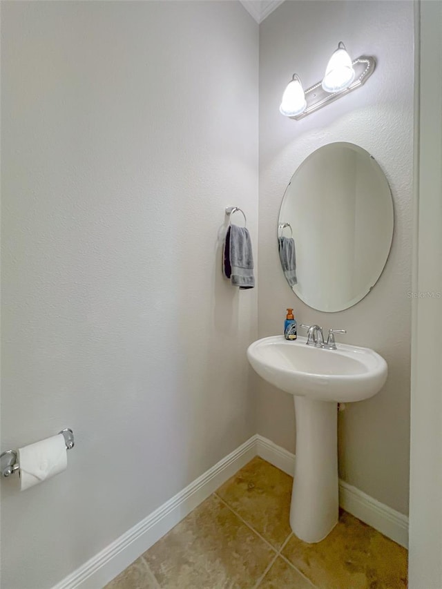 bathroom with tile patterned floors