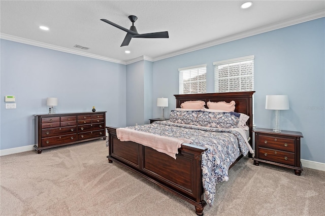 bedroom with ceiling fan, crown molding, and light colored carpet