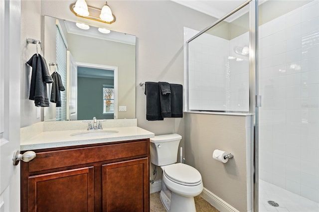 bathroom with a shower with shower door, toilet, ornamental molding, and vanity