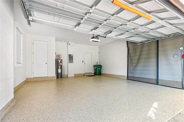 garage featuring electric panel, electric water heater, and a garage door opener