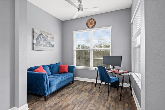 office space featuring ceiling fan, wood finished floors, and baseboards