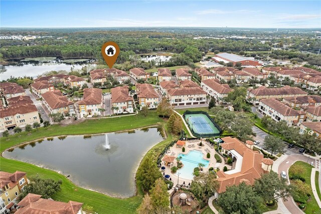 bird's eye view with a water view and a residential view