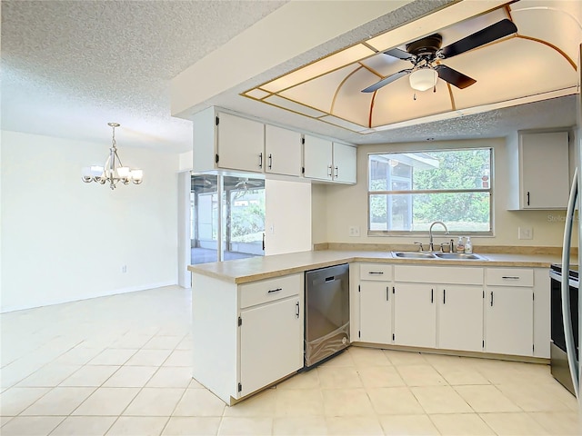 kitchen with sink, kitchen peninsula, decorative light fixtures, white cabinets, and appliances with stainless steel finishes