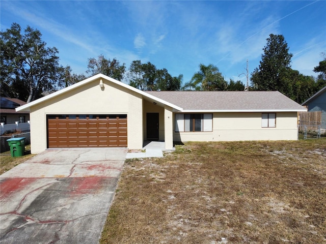 single story home featuring a garage