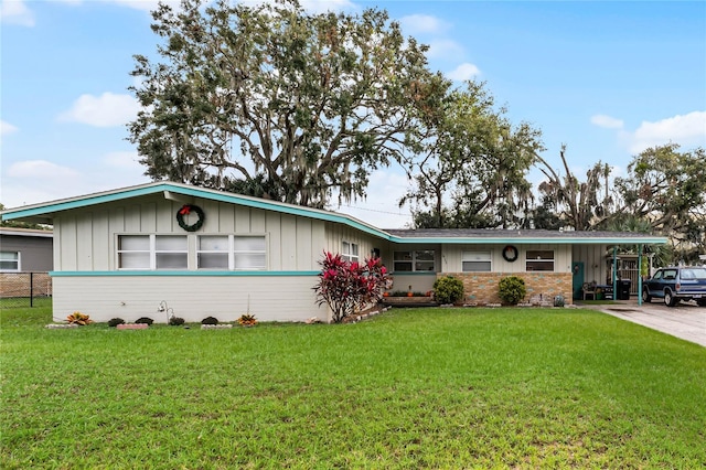 ranch-style home with a front yard