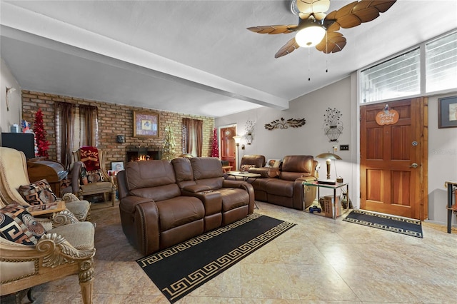 living room with a fireplace, vaulted ceiling, ceiling fan, and brick wall