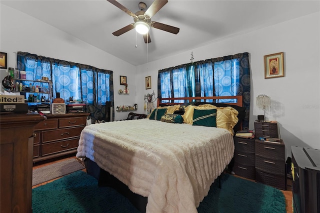 bedroom featuring vaulted ceiling and ceiling fan