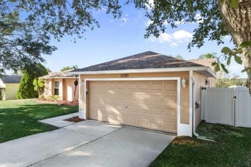 garage with a yard