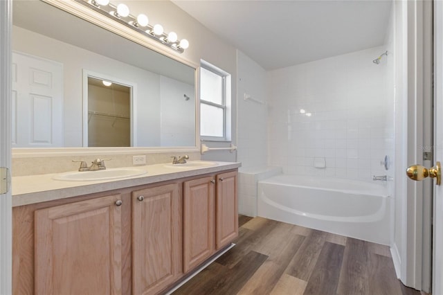 bathroom featuring vanity and hardwood / wood-style flooring