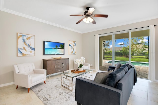 living room featuring ceiling fan, light tile patterned floors, and ornamental molding